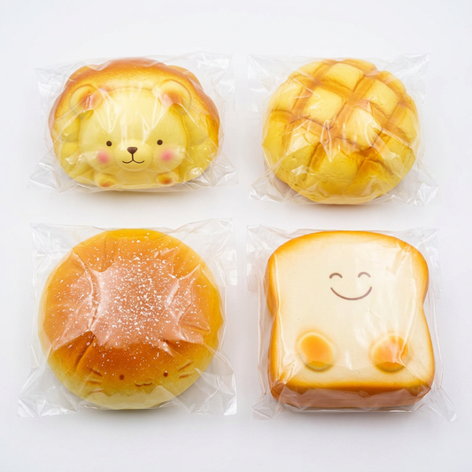 Bread-shaped squishy toys on a clean white background